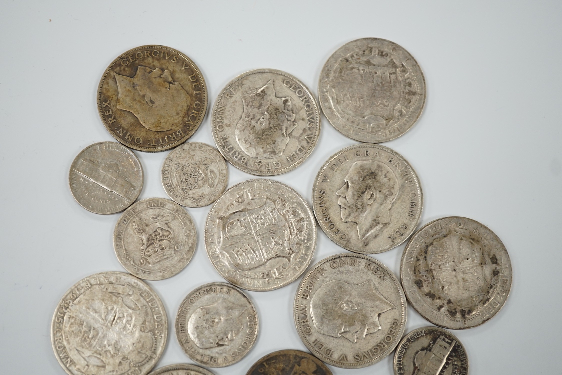 A selection of silver and cupro nickel coins, dating from Victoria to George V